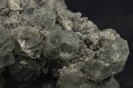 Cluster of translucent grey celestine crystals with natural rough matrix