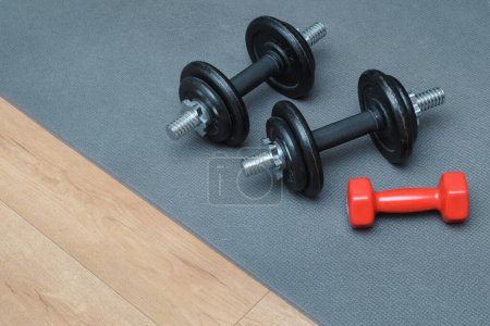 Fitness concept. Sport mat, dumpbells. Active lifestyle sport. Workout at home or gym web banner.