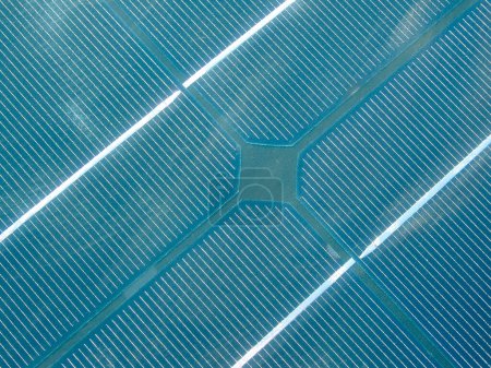 Solar panel background blue panels cells close up. Photovoltaic technology for sustainability, renewable and clean energy