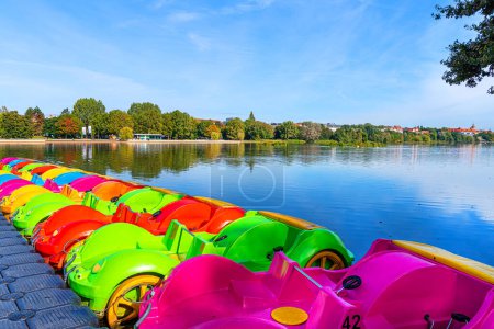 Photo for Wohrder See recreation area with brightly colored pedal boats, Nuremberg - Royalty Free Image