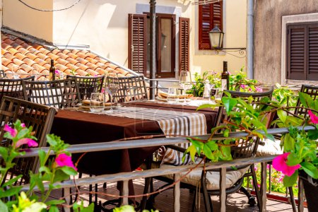 Cosy terrace in the old town of Lovran, Istria, Croatia