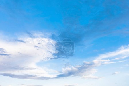 Photo for Blue sky with unusual cumulus white clouds photographed on a warm sunny day , can be used as a blank - Royalty Free Image
