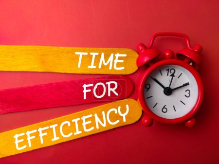 Photo for Clock and wooden stick with word TIME FOR EFFICIENCY on a red background - Royalty Free Image