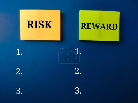 Photo for Sticky note with the word RISK REWARD list on a blue background - Royalty Free Image
