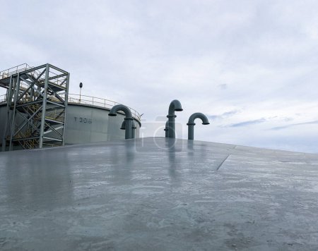 Foto de Una tubería para liberar la presión del aire por encima de un gran tanque de almacenamiento de aceite en un área industrial - Imagen libre de derechos