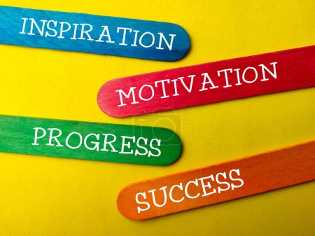 Photo for Word INSPIRATION MOTIVATION PROGRESS SUCCESS on a yellow background - Royalty Free Image