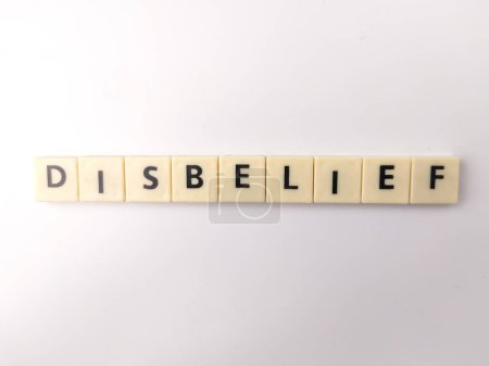Photo for Toys word with the word DISBELIFE on a white background - Royalty Free Image