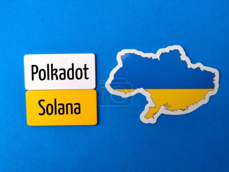Photo for Top view ukraine flag with text Polkadot Solana on blue background. - Royalty Free Image