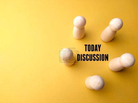 Photo for Top view Wooden people figures with text TODAY DISCUSSION on yellow background. - Royalty Free Image