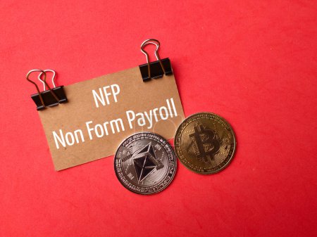 Photo for Top view digital currency with text NFP non form payroll on red background. - Royalty Free Image