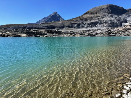 High-altitude Frost: Panoramic Views of Alpine Glacier Lake, Hautes Alps, France