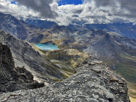 Glacial Wonder: Alpine Trail with Lake Glacier, aiguille de la grande sassiere, Val d'Isere, France