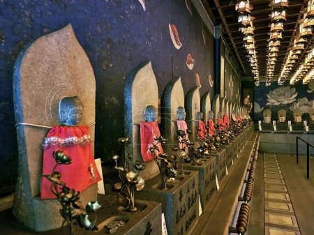 Ethereal Guardians: Stone Figures Inside Temple in Miyajima, Hiroshima, Japan