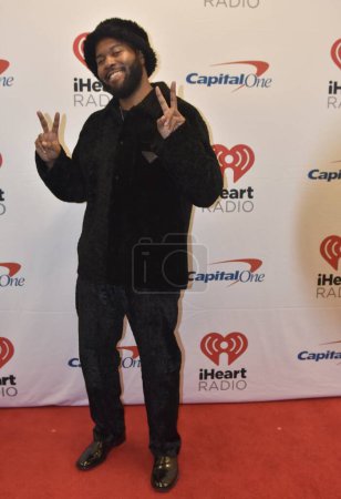 Photo for Khalid arrives on the Red Carpet at the Q102 iHeartRadio Jingle Ball. December 12, 2022, Philadelphia, Pennsylvania, USA: Khalid arrives on the red carpet at the Q102 iHeartRadio Jingle Ball presented by Capital One at Wells Fargo Center - Royalty Free Image