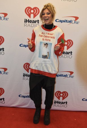 Photo for Jax arrives on the Red Carpet at the Q102 iHeartRadio Jingle Ball. December 12, 2022, Philadelphia, Pennsylvania, USA: Jax arrives on the red carpet at the Q102 iHeartRadio Jingle Ball presented by Capital One at Wells Fargo Center - Royalty Free Image
