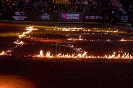 Téléchargez les photos : 2023 Professional Bull Riders Unleash The Beast At The Garden. January 08, 2023, New York, New York, USA: PBR letters on fire seen on the field during the opening ceremony for the third round of the Professional Bull Riders 2023 - en image libre de droit