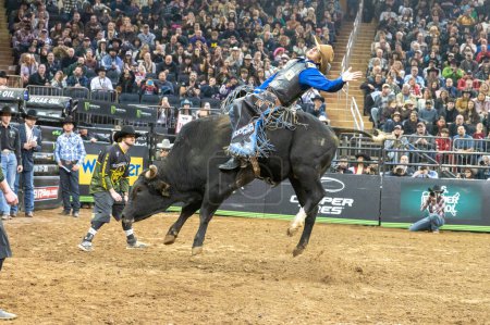 Photo for 2023 Professional Bull Riders Unleash The Beast At The Garden. January 08, 2023, New York, New York, USA: Eduardo Aparecido rides Concho during third round of the Professional Bull Riders 2023 Unleash The Beast event at Madison Square Garden - Royalty Free Image