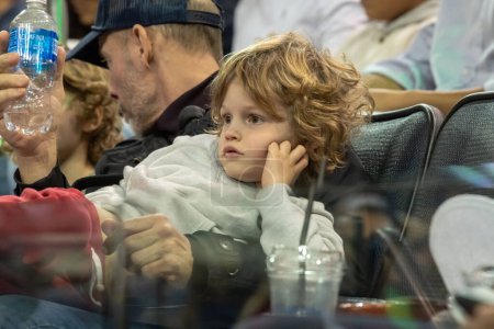 Téléchargez les photos : 2023 Professional Bull Riders Unleash The Beast At The Garden. January 08, 2023, New York, New York, USA: A child watches the competition during third round of the Professional Bull Riders 2023 Unleash The Beast event at Madison Square Garden - en image libre de droit