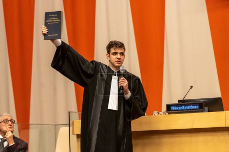 Photo for International Mock Trial on Human Rights. January 31, 2023, New York, New York, USA: A student presents his case during a special event International Mock Trial on Human Rights on the occasion of the International Day of Commemoration in Memory - Royalty Free Image