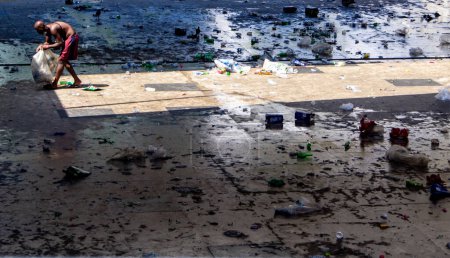 Photo for Trash after Street Carnival Parade in Rio de Janeiro. February 19, 2023, Rio de Janeiro, Brazil: After the Boitata block carnival parade in Praca XV, downtown Rio de Janeiro, revelers left a lot of trash on the square on Sunday (19) afternoon. - Royalty Free Image