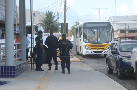 Photo for Criminals attack and set fire on two buses in Natal. February 22, 2023, Natal, Rio Grande do Norte, Brazil: The criminal attack that resulted in two buses partially set on fire earlier on Wednesday (22) - Royalty Free Image