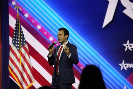 Photo for Vivek Ramaswamy, Republican presidential candidate during CPAC Covention in Maryland. March 03, 2023, Maryland, USA: Vivek Ramaswamy,a businessman and republican presidential candidate during CPAC convention  Protecting America Now - Royalty Free Image