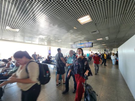 Photo for The end of obligatory use of Masks in Brazilian airports and planes. March 03, 2023, Sao Paulo, Brazil: The National Health Surveillance Agency (Anvisa) removed the mandatory use of masks in Brazilian airports and planes - Royalty Free Image