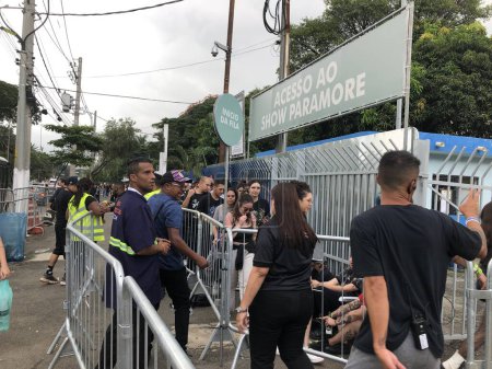 Photo for Fans lining up to see Paramore Band in Sao Paulo. March 11, 2023, Sao Paulo, Brazil: Fans lined up getting ready to see American band, PARAMORE Show in Sao Paulo with more than 18 thousand tickets sold - Royalty Free Image