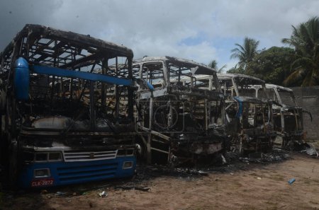 Photo for Criminals continue their attacks setting fire on buses in Natal. March 15, 2023, Natal, Rio Grande do Norte, Brazil: The Bus Terminal in Natal RN, and the garage of a private tourist bus company were targets of criminals - Royalty Free Image