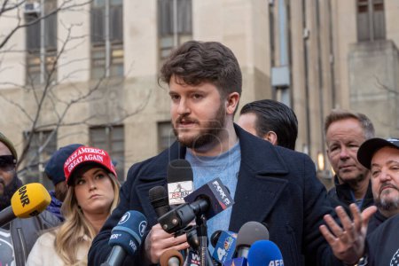 Photo for New York Young Republican Club Answers Trump's Call For Rallies. March 20, 2023. New York, USA: President Trump's supporters gather for a rally, outside the court house, in support of former President Donald Trump - Royalty Free Image