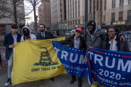 Photo for New York Young Republican Club Answers Trump's Call For Rallies. March 20, 2023. New York, USA: President Trump's supporters gather for a rally, outside the court house, in support of former President Donald Trump - Royalty Free Image