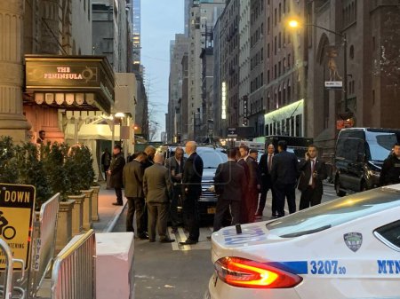 Photo for The arrival of Foreign Dignitaries at The Peninsula Hotel in NYC. March 22, 2023, New York, USA:The arrival of Foreign Dignitaries at The Peninsula Hotel on 5th Avenue in New York has drawn many NYPD and Secret Service officers - Royalty Free Image
