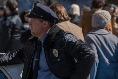 Photo for Celebrity Sightings In New York. March 26, 2023, New York, New York, USA: A Gotham Police officer on movie set of the Joker: Folie a Deux by the New York County Supreme Court on March 26, 2023 in New York City. - Royalty Free Image