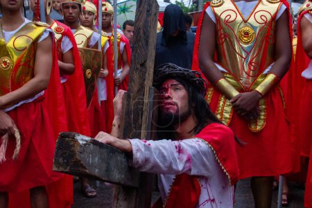 Photo for (INT) Passion of Christ performed on Good Friday by actors in Rio. April 07, 2023, Rio de Janeiro, Brazil: On Friday (07), the traditional Via Sacra of Complexo do Alemao (CPX) took place where actors performed The Passion of Christ - Royalty Free Image