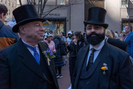 Photo for 2023 New York City Easter Bonnet Parade. April 09, 2023, New York, New York, USA: Men in 19th century clothing seen during the Easter Parade and Bonnet Festival 2023 outside St. Patrick's Cathedral along Fifth Avenue on Easter Sunday - Royalty Free Image
