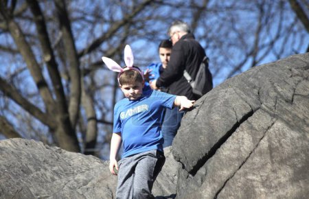 Photo for Easter Holiday Celebrated at Central Park.April 09, 2023, New York, USA: New Yorkers and Tourists are seen celebrating the Easter holiday at Central Park on Sunday (09). The park is crowded with people having picnics, playing sports - Royalty Free Image