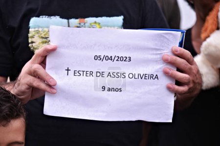 Photo for (INT) NGO promotes a protest against the death of killed Ester Oliveira at Copacabana Beach. April 08, 2023, The NGO Rio de Paz promoted a protest against the death of 9-year-old girl Ester de Assis Oliveira on Copacabana Beach - Royalty Free Image