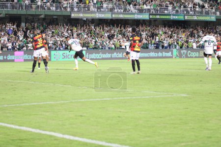 Photo for Brazil Cup: Coritiba vs Sport Recife. April 12, 2023, Curitiba, Parana, Brazil: Soccer game between Coritiba and Sport Recife, valid for the third round of the Copa do Brasil, "Brazil Cup," at Couto Pereira Stadium. The game ended 3-3. - Royalty Free Image