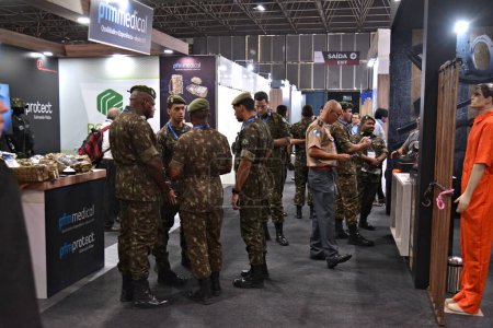 Photo for Defense and Security International Fair-LAAD in Rio. April 12, 2023, Rio de Janeiro, Brazil: Defense and Security Fair-LAAD took place at the Riocentro Convention Center, aiming at military personnel, police forces, public safety authorities - Royalty Free Image
