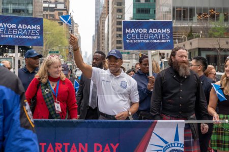Photo for 25th Annual New York City Tartan Day Parade. April 15, 2023, New York, New York, USA: New York City Mayor Eric Adams march up Sixth Avenue during the 25th Annual Tartan Day Parade in Manhattan on April 15, 2023 in New York City. - Royalty Free Image