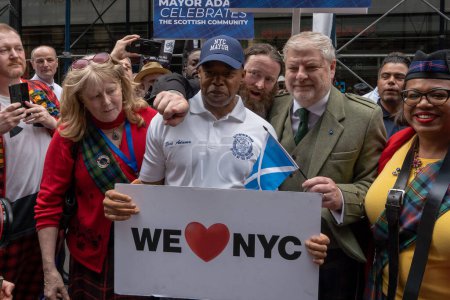 Photo for 25th Annual New York City Tartan Day Parade. April 15, 2023, New York, New York, USA: New York City Mayor Eric Adams pose with VIP during the 25th Annual Tartan Day Parade in Manhattan on April 15, 2023 in New York City. - Royalty Free Image