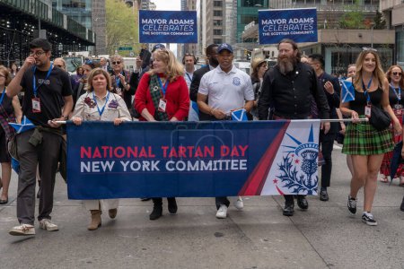 Photo for 25th Annual New York City Tartan Day Parade. April 15, 2023, New York, New York, USA: New York City Mayor Eric Adams march up Sixth Avenue during the 25th Annual Tartan Day Parade in Manhattan on April 15, 2023 in New York City. - Royalty Free Image