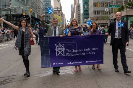 Photo for 25th Annual New York City Tartan Day Parade. April 15, 2023, New York, New York, USA: Angus Robertson (2L) and other Scottish Parliament members march up Sixth Avenue during the 25th Annual Tartan Day Parade in Manhattan on April 15, 2023 - Royalty Free Image