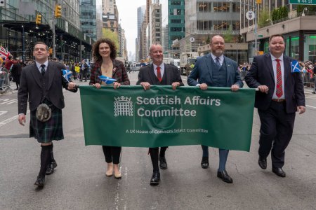 Photo for 25th Annual New York City Tartan Day Parade. April 15, 2023, New York, New York, USA: Douglas Ross MP, Wendy Chamberlain MP, Pete Wishart MP, David Duguid MP and Andrew Western MP members of the U.K. House of Commons Scottish Affairs Select - Royalty Free Image