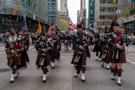 Photo for 25th Annual New York City Tartan Day Parade. April 15, 2023, New York, New York, USA: Bagpipe players march at the 25th Annual Tartan Day Parade in Manhattan on April 15, 2023 in New York City. - Royalty Free Image