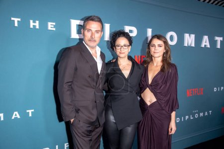 Photo for Netflix's "The Diplomat" New York Premiere. April 18, 2023, New York, New York, USA: Rufus Sewell, Debora Cahn and Keri Russell attend Netflix's "The Diplomat" New York Premiere at Park Lane Hotel on April 18, 2023 - Royalty Free Image