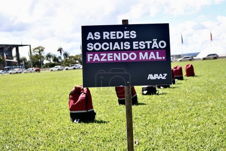 Photo for Act to remember the victims of violence in schools. May 2, 2023. Brasilia, Distrito Federal, Brazil: The civic movement Avaaz promotes an act in front of the National Congress, in Brasilia, to remember the victims of violence in schools - Royalty Free Image