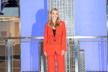 Photo for His Majesty's Consul General of New York Emma Wade-Smith Lights the Empire State Building in Celebration of the Coronation. May 05, 2023, New York, New York, USA: Katherine Jenkins attends the Empire State Building lighting ceremony - Royalty Free Image