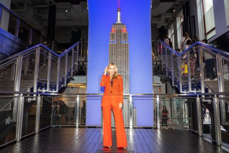 Photo for His Majesty's Consul General of New York Emma Wade-Smith Lights the Empire State Building in Celebration of the Coronation. May 05, 2023, New York, New York, USA: Katherine Jenkins attends the Empire State Building lighting ceremony - Royalty Free Image