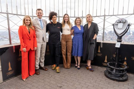 Photo for His Majesty's Consul General of New York Emma Wade-Smith Lights the Empire State Building in Celebration of the Coronation. May 05, 2023, New York, New York, USA: (L-R) Katherine Jenkins, Henry Timms, Shantell Martin, Hannah Young - Royalty Free Image